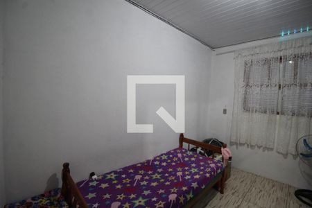 Quarto 1 de casa à venda com 3 quartos, 300m² em Guajuviras, Canoas