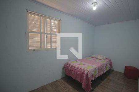Quarto 1 de casa à venda com 3 quartos, 114m² em Guajuviras, Canoas