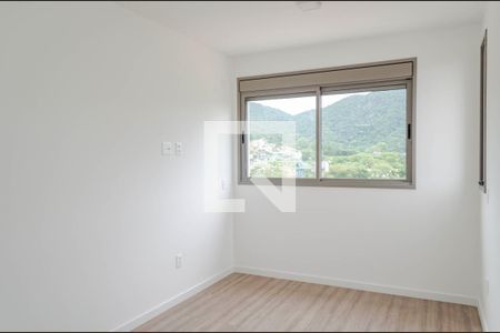 Suíte - Dormitório de apartamento para alugar com 2 quartos, 67m² em Cacupé, Florianópolis