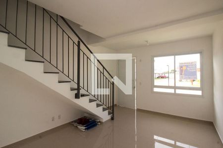 Sala de casa de condomínio para alugar com 2 quartos, 60m² em Vila Nova, Porto Alegre