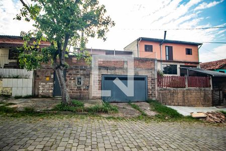 Fachada de casa à venda com 3 quartos, 98m² em Vila Nova, Porto Alegre