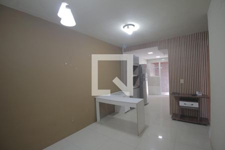 Sala de casa de condomínio à venda com 2 quartos, 42m² em Olaria, Canoas