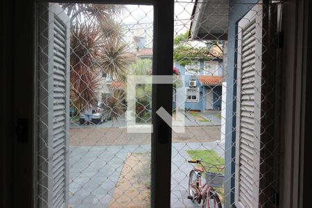 Vista da Sala de casa de condomínio à venda com 3 quartos, 123m² em Vila Nova, Porto Alegre