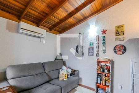 Sala de casa de condomínio à venda com 2 quartos, 102m² em Guarujá, Porto Alegre