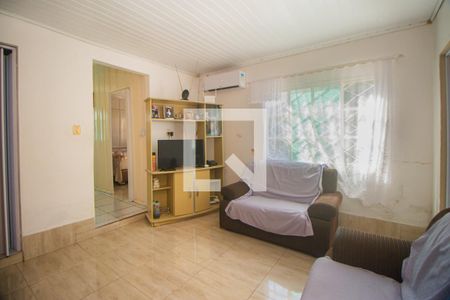 Sala de casa à venda com 3 quartos, 100m² em Sarandi, Porto Alegre