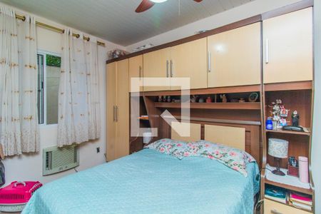 Quarto 2 de casa de condomínio à venda com 3 quartos, 120m² em Vila Nova, Porto Alegre