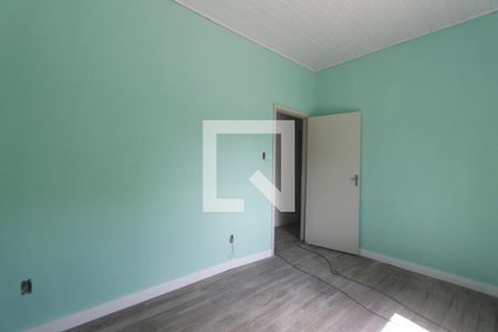 Quarto 1 de casa para alugar com 2 quartos, 80m² em Santa Maria Goretti, Porto Alegre