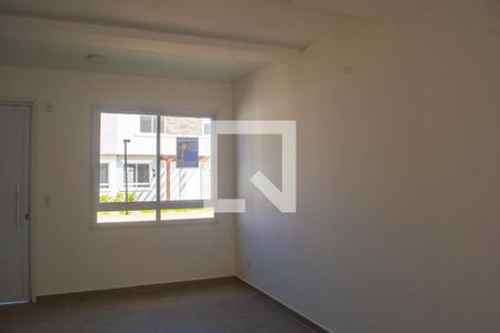 Sala de casa de condomínio para alugar com 2 quartos, 87m² em Vila Nova, Porto Alegre