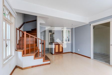 Sala de casa de condomínio para alugar com 3 quartos, 124m² em Ipanema, Porto Alegre