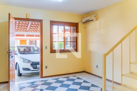 Sala de casa de condomínio para alugar com 2 quartos, 112m² em Tristeza, Porto Alegre