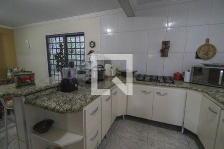 Casa à venda com 1400m², 6 quartos e 5 vagas Casa à venda com 1400m², 6 quartos e 5 vagasCozinha e Área de Serviço