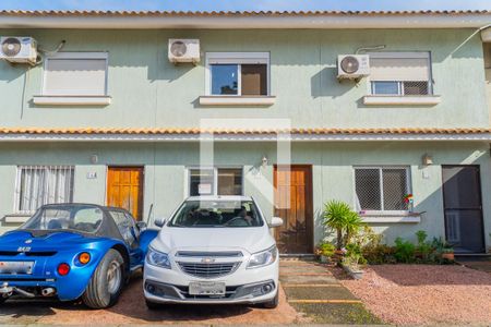 Fachada de casa de condomínio à venda com 2 quartos, 97m² em Hípica, Porto Alegre