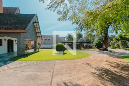 Casa de condomínio para alugar com 580m², 6 quartos e 4 vagas Casa de condomínio para alugar com 580m², 6 quartos e 4 vagasFachada frente