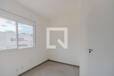 Quarto 2 de casa de condomínio para alugar com 2 quartos, 82m² em Campo Novo, Porto Alegre