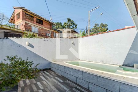 Área externa de casa à venda com 1 quarto, 70m² em Vila Nova, Porto Alegre