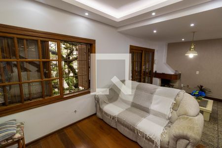Sala de casa de condomínio à venda com 3 quartos, 190m² em Glória, Porto Alegre