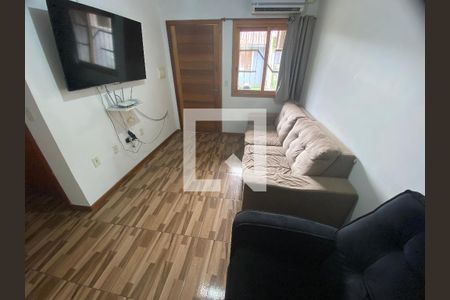 Sala de casa de condomínio para alugar com 2 quartos, 50m² em Jardim Algarve, Alvorada