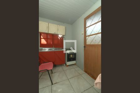 Sala / Cozinha de casa para alugar com 1 quarto, 35m² em São Geraldo, Porto Alegre