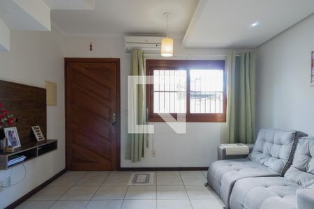 Sala de casa de condomínio à venda com 3 quartos, 95m² em Nonoai, Porto Alegre