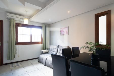 Sala de casa de condomínio à venda com 3 quartos, 95m² em Nonoai, Porto Alegre