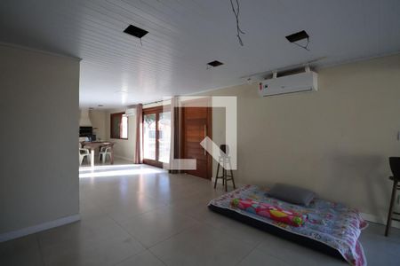 Sala de TV de casa à venda com 3 quartos, 161m² em Harmonia, Canoas