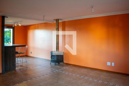 Sala de casa de condomínio para alugar com 4 quartos, 255m² em Ipanema, Porto Alegre