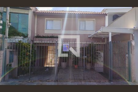 Casa à venda com 158m², 3 quartos e 2 vagas Casa à venda com 158m², 3 quartos e 2 vagasFachada e Garagem