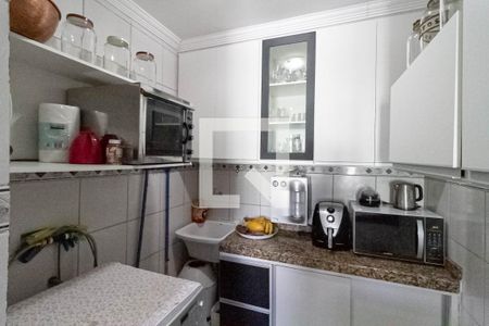 Casa à venda com 135m², 3 quartos e 2 vagas Casa à venda com 135m², 3 quartos e 2 vagasCozinha e Área de Serviço