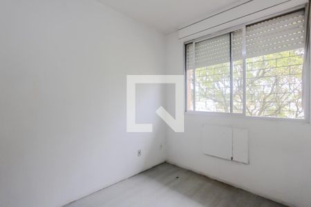 Quarto 1 de apartamento para alugar com 2 quartos, 55m² em Jardim Itu, Porto Alegre