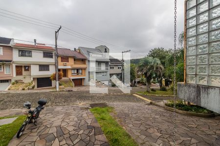 Vista de casa de condomínio à venda com 4 quartos, 258m² em Vila Nova, Porto Alegre