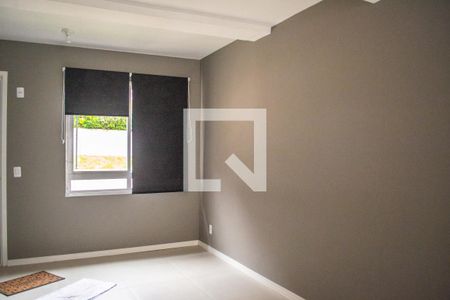 Sala de casa de condomínio para alugar com 2 quartos, 87m² em Vila Nova, Porto Alegre