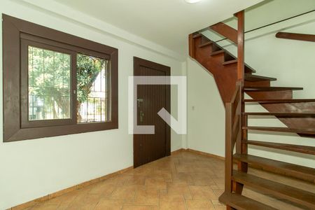 Hall de entrada de casa à venda com 5 quartos, 200m² em Petrópolis, Porto Alegre