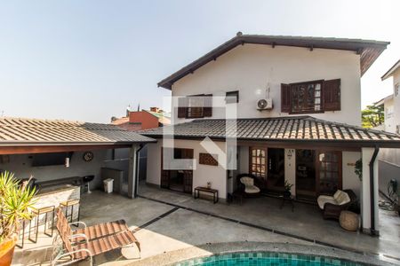 Casa de condomínio à venda com 380m², 4 quartos e 4 vagas Casa de condomínio à venda com 380m², 4 quartos e 4 vagasFachada