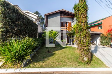 Casa de condomínio à venda com 380m², 4 quartos e 4 vagas Casa de condomínio à venda com 380m², 4 quartos e 4 vagasVista da Rua