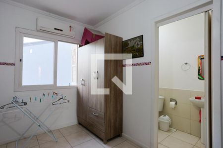 Suíte de casa à venda com 2 quartos, 130m² em Guarujá, Porto Alegre