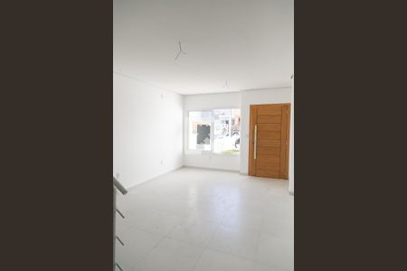 Sala de casa à venda com 3 quartos, 127m² em Guarujá, Porto Alegre