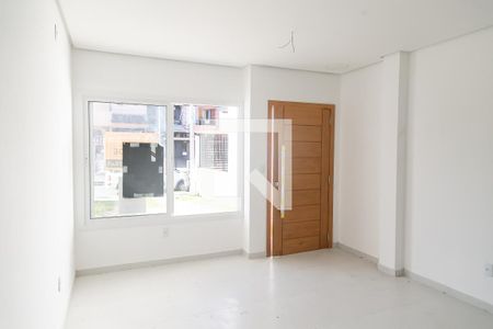 Sala de casa à venda com 3 quartos, 127m² em Guarujá, Porto Alegre