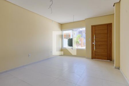 Sala de casa à venda com 3 quartos, 127m² em Guarujá, Porto Alegre