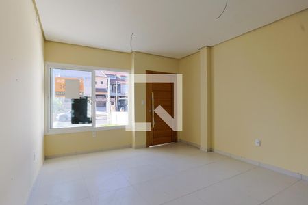 Sala de casa à venda com 3 quartos, 127m² em Guarujá, Porto Alegre