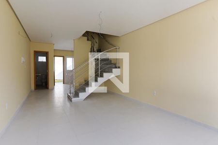 Sala de casa à venda com 3 quartos, 127m² em Guarujá, Porto Alegre