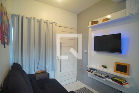 Sala de casa de condomínio à venda com 2 quartos, 50m² em Rondônia, Novo Hamburgo