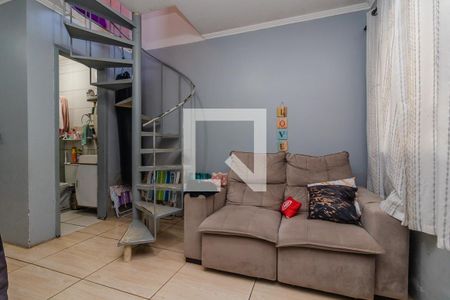 Sala de casa à venda com 2 quartos, 112m² em Vila Nova, Porto Alegre