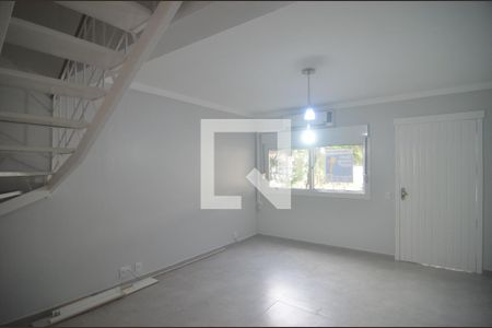 Sala de casa de condomínio para alugar com 2 quartos, 87m² em Fátima, Canoas