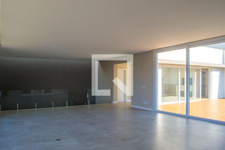 Sala principal de casa de condomínio à venda com 3 quartos, 310m² em Vila Nova, Porto Alegre