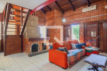 Sala de casa à venda com 4 quartos, 174m² em Vila Nova, Porto Alegre