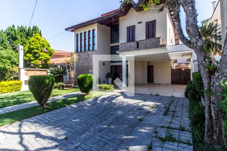 Casa de condomínio à venda com 435m², 4 quartos e 2 vagas Casa de condomínio à venda com 435m², 4 quartos e 2 vagasGaragem