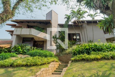 Casa de condomínio para alugar com 1400m², 8 quartos e 4 vagas Casa de condomínio para alugar com 1400m², 8 quartos e 4 vagasFachada