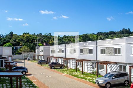 Quarto 2 - vista de casa de condomínio à venda com 2 quartos, 81m² em Campo Novo, Porto Alegre