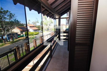 Sacada da Sala 1 de casa de condomínio à venda com 3 quartos, 220m² em Nonoai, Porto Alegre