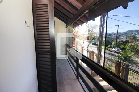 Sacada da Sala 1 de casa de condomínio à venda com 3 quartos, 220m² em Nonoai, Porto Alegre